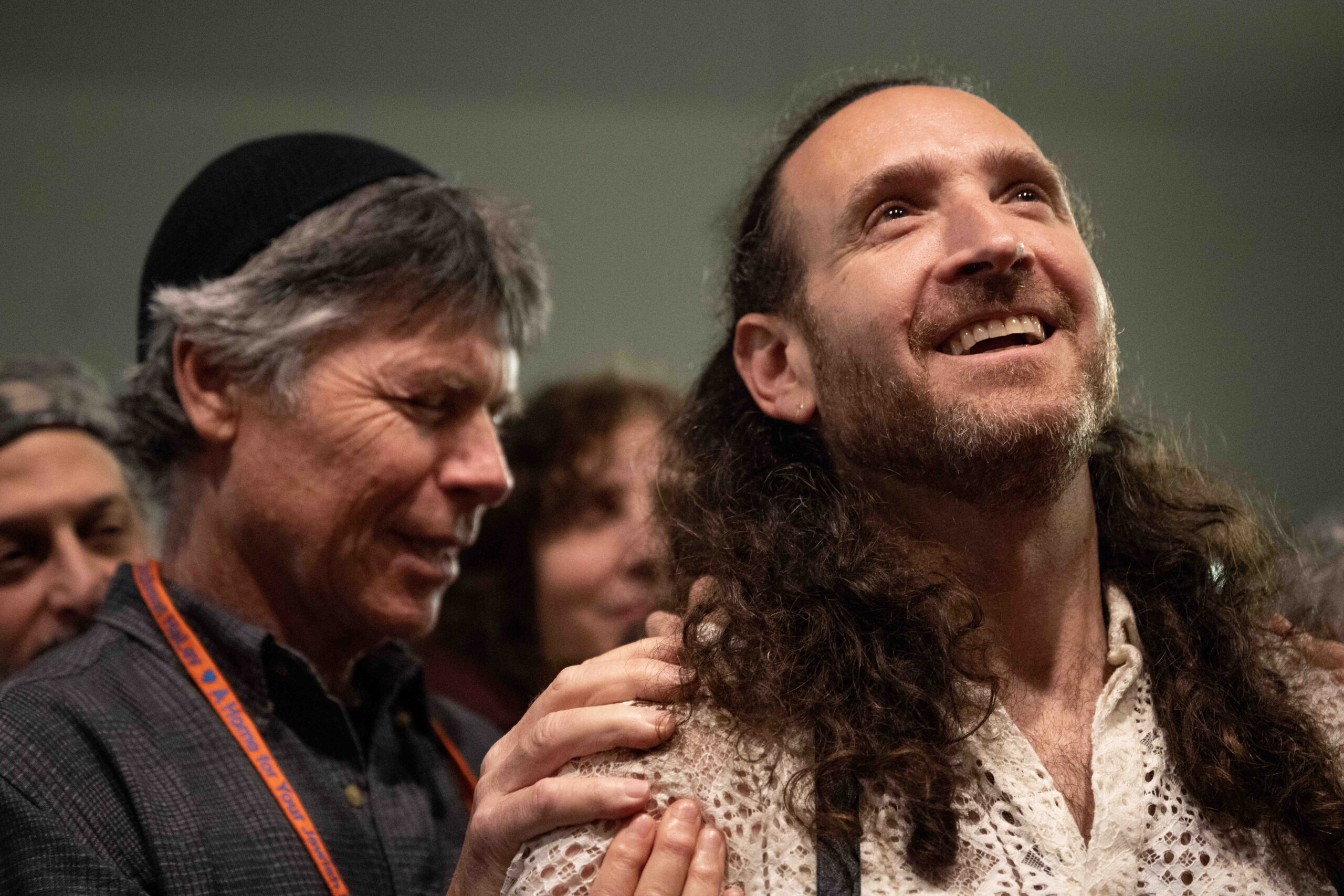 Rabbi Zvika Krieger is blessed by the community during a celebration for Krieger’s rabbinic ordination and installation at the Renewal synagogue Chomat HaLev in Berkeley on Saturday, Jan. 25, 2025. (Aaron Levy-Wolins/J. Staff)